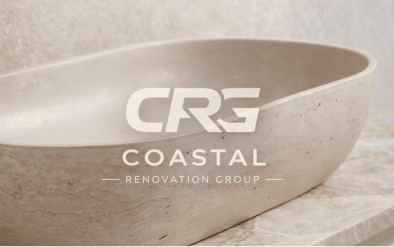 The Coastal Renovation Group logo over a stone vessel basin
