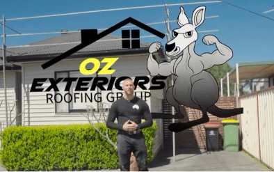 The owner of OZ Exteriors Roofing Group outside a house, under the company logo and its kangaroo mascot